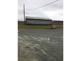 6 Acres with mobile home, 54' x 88' heated and insulated pole building with office, equipment storage, shop, overhead storage and restroom.  Well and 2 septic systems.  24' x 40' livestock or storage building.

Great for mini-farm or additional storage and shop for local farmers.  Excellent potential building site. - 6 Acres with Mobile Home, Pole Building & Storage or Livestock Building